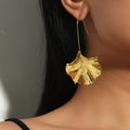 Golden Dangling Petal Earrings