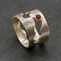Hollow Wavy Red Zirconia Ring