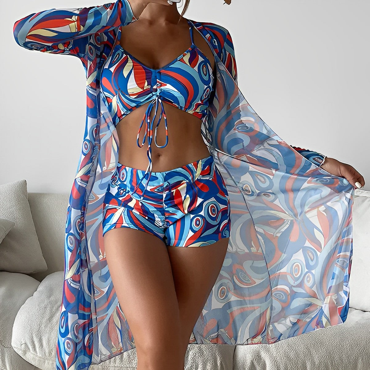 LM | Swimsuit with swirl pattern and overlay