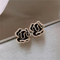 Black Lotus Earrings in Gold