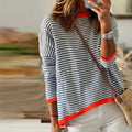 LM | Blue striped sweater with orange trim